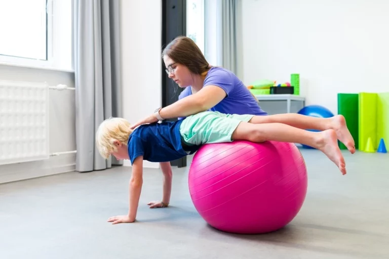 YBL CATT therapist assessing a child for his physiotherapy