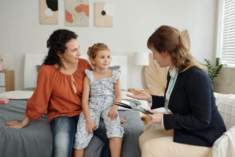 The YBL CATT worker working with adoptive family at home setup